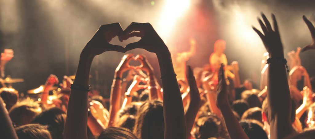 person performing heart hand gesture